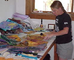 In the quilt studio at the cutting table